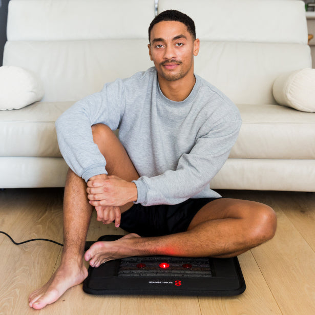  Man Sitting On Infrared PEMF Mat Mini